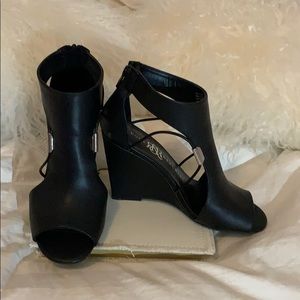 Black wedge sandals